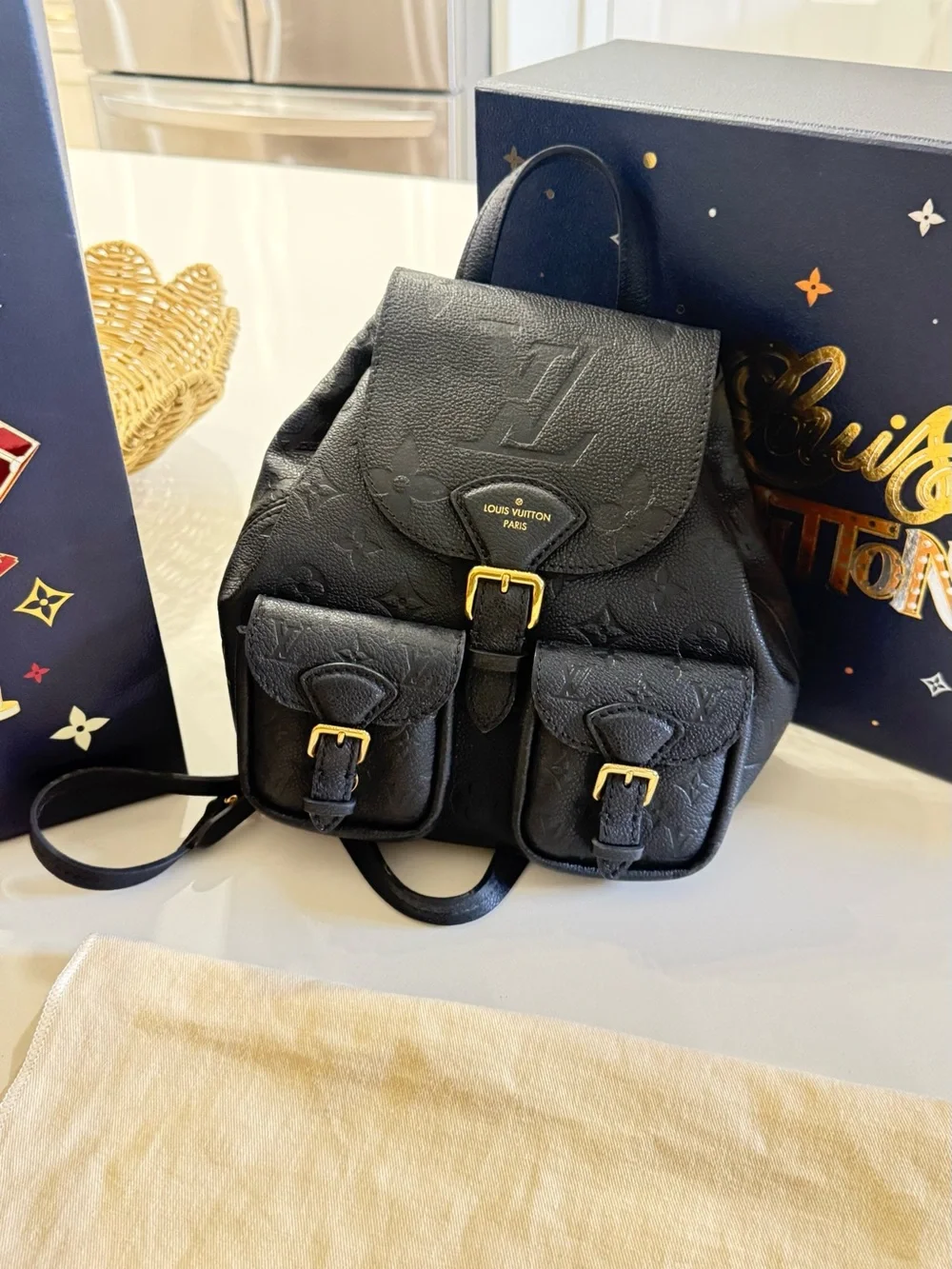 Louis Vuitton Black Monogram Embossed Leather Backpack with Gold Chain Straps